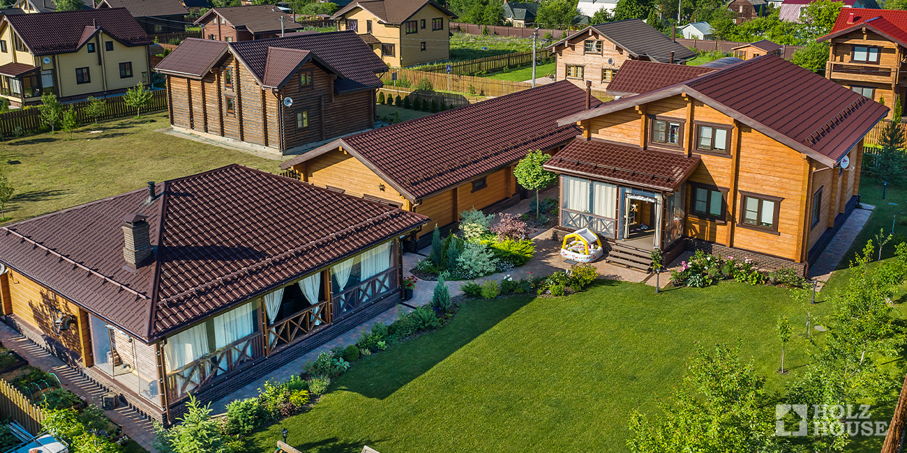 Что лучше – клееный брус или оцилиндрованное бревно