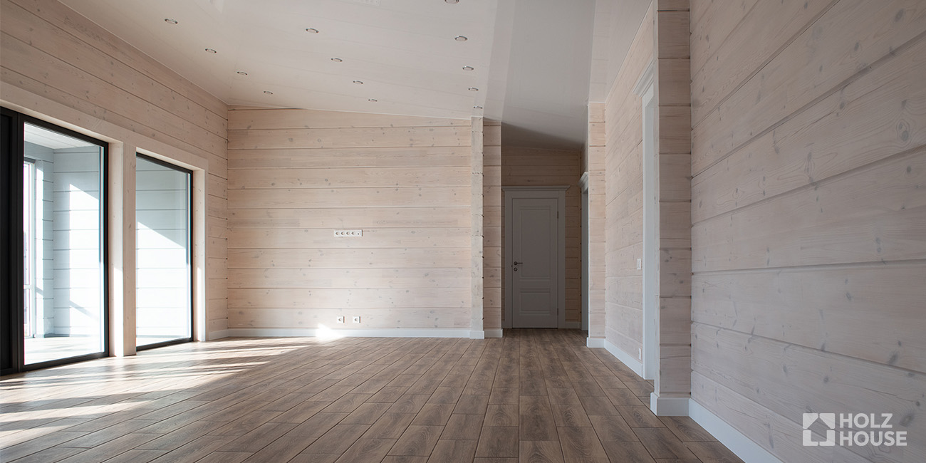 Перепланировка в доме из клееного бруса: можно ли сносить стены?