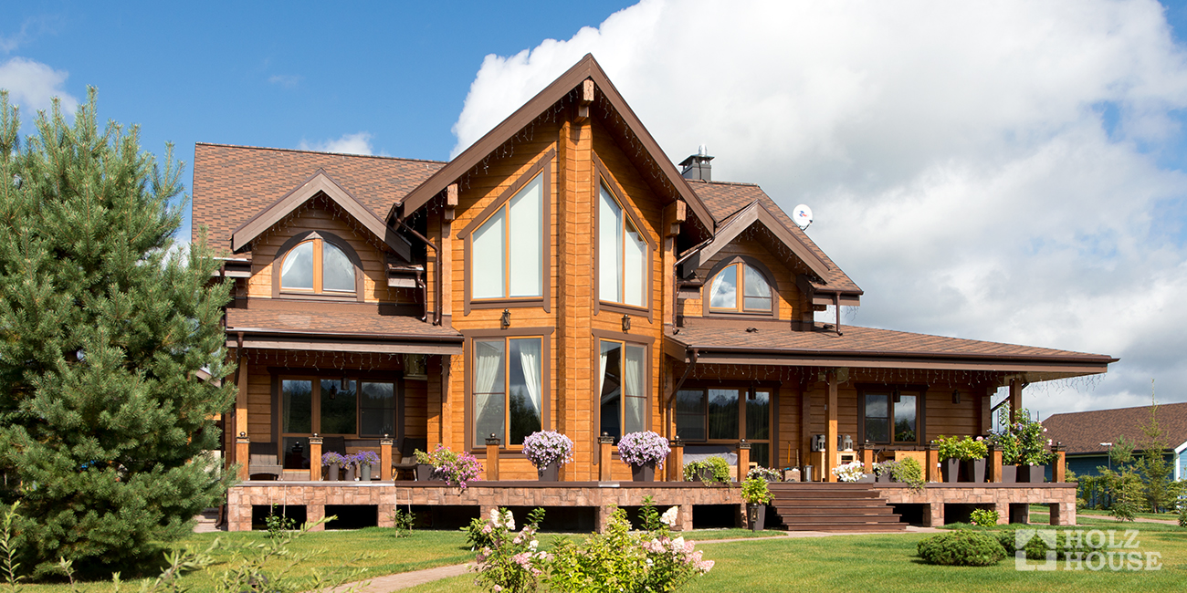 Покраска дома из клееного бруса