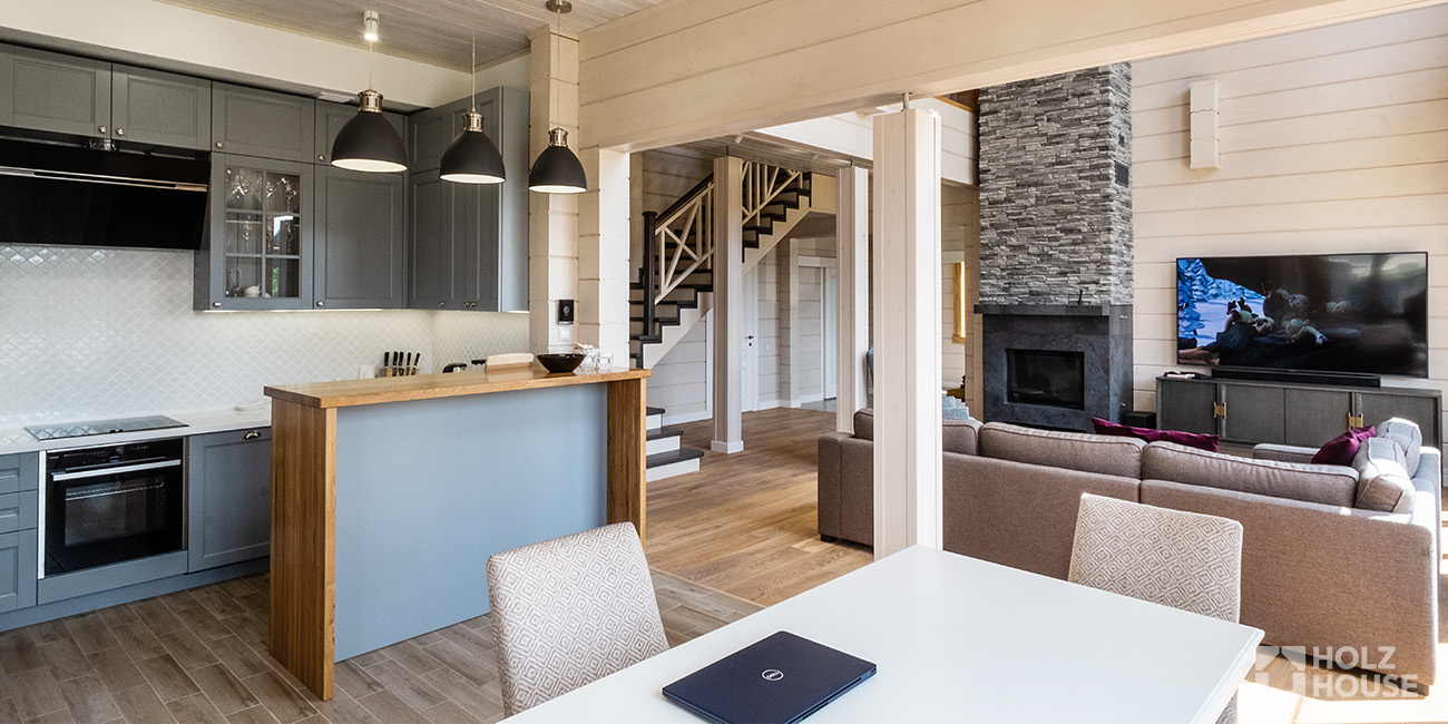 Перепланировка в доме из клееного бруса: можно ли сносить стены?