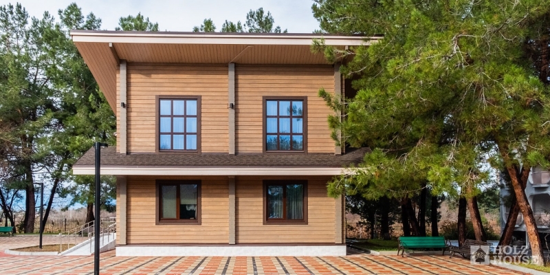 Двухэтажная усадьба из клееного бруса по проекту Пицунда - фото 4 на сайте Holz House