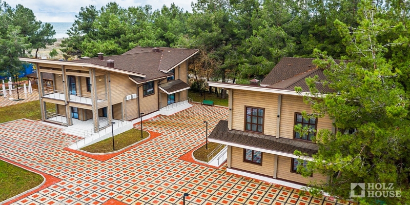 Двухэтажная усадьба из клееного бруса по проекту Пицунда - фото 9 на сайте Holz House